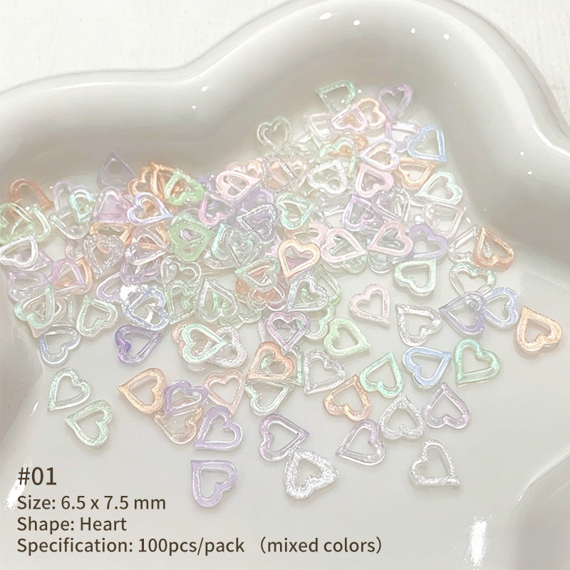 100pcs Hollowed Heart Plastic Nail Decoration